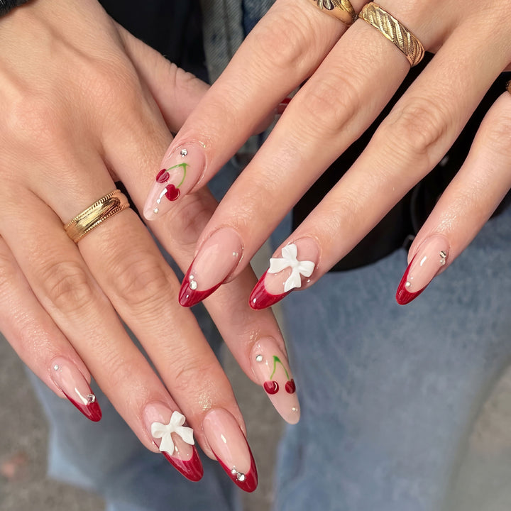 Artistic Cherry and Bow Nail Art Design
