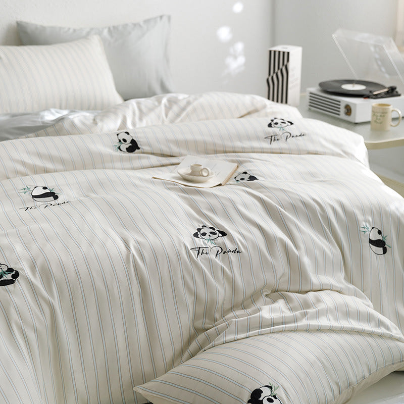 Quilted bed set with panda embroidery and fine stripe texture