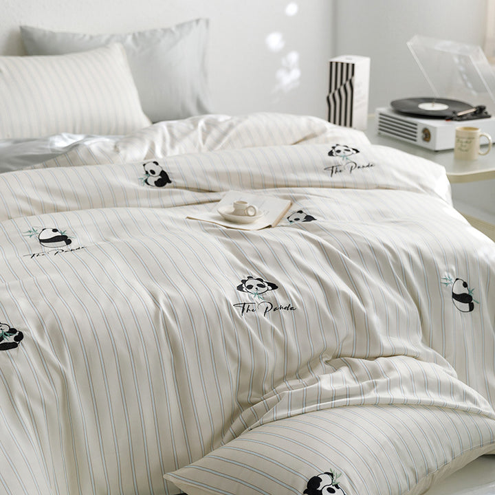 Quilted bed set with panda embroidery and fine stripe texture