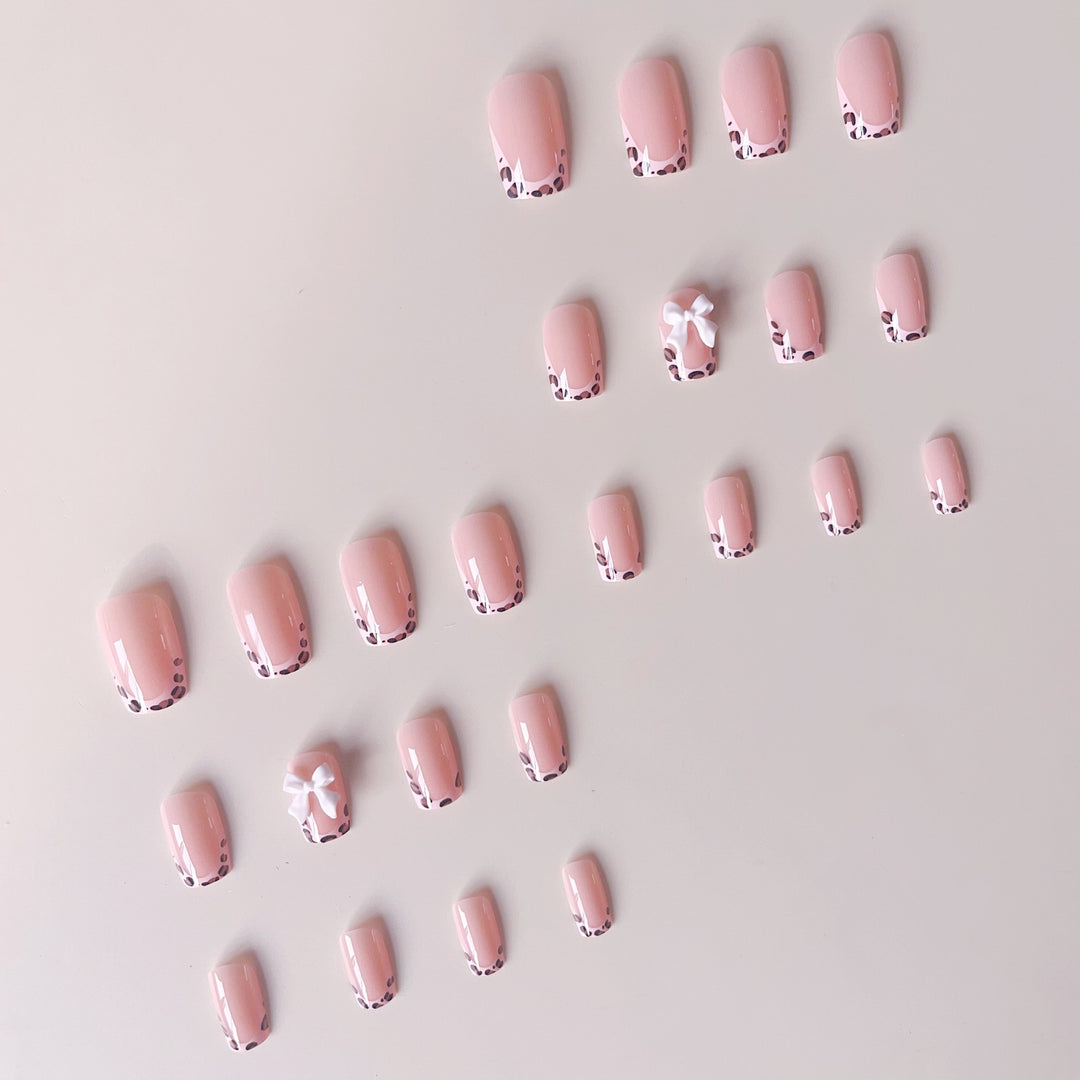 Artificial nails with leopard pattern and bows Stornfield