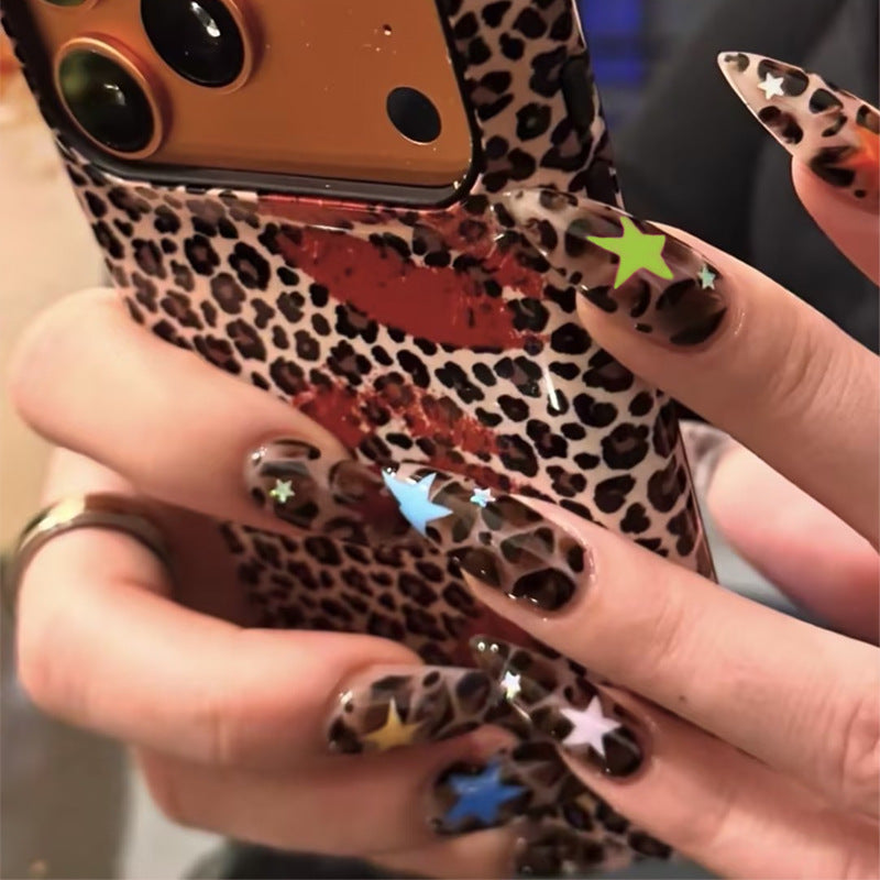 Acrylic nail set with animal pattern and colorful star accents Stornfield