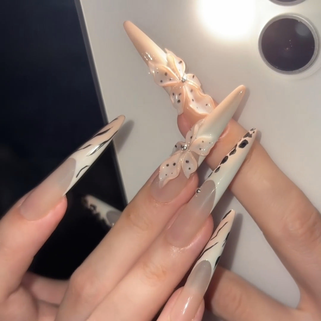Elegant artificial nails with flower and animal design Stornfield