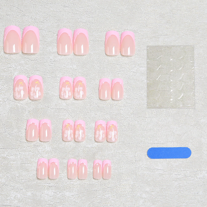 Artificial nails with floral designs and elegant shape Stornfield