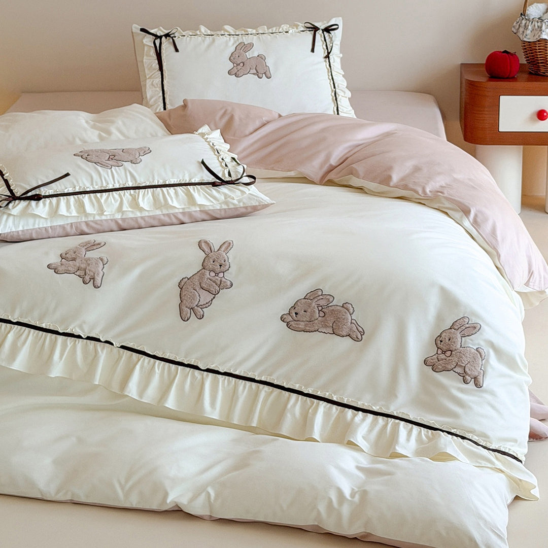 Romantic duvet cover set with embroidered bunnies, ruffled edge and reversible function