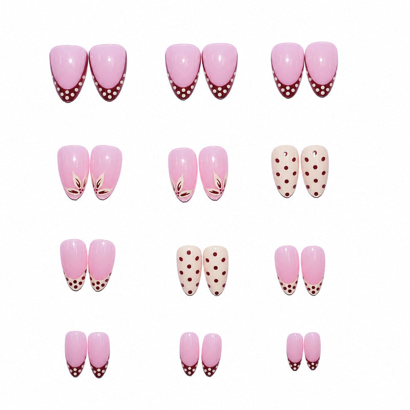 Elegant artificial nails with floral and dotted design Stornfield