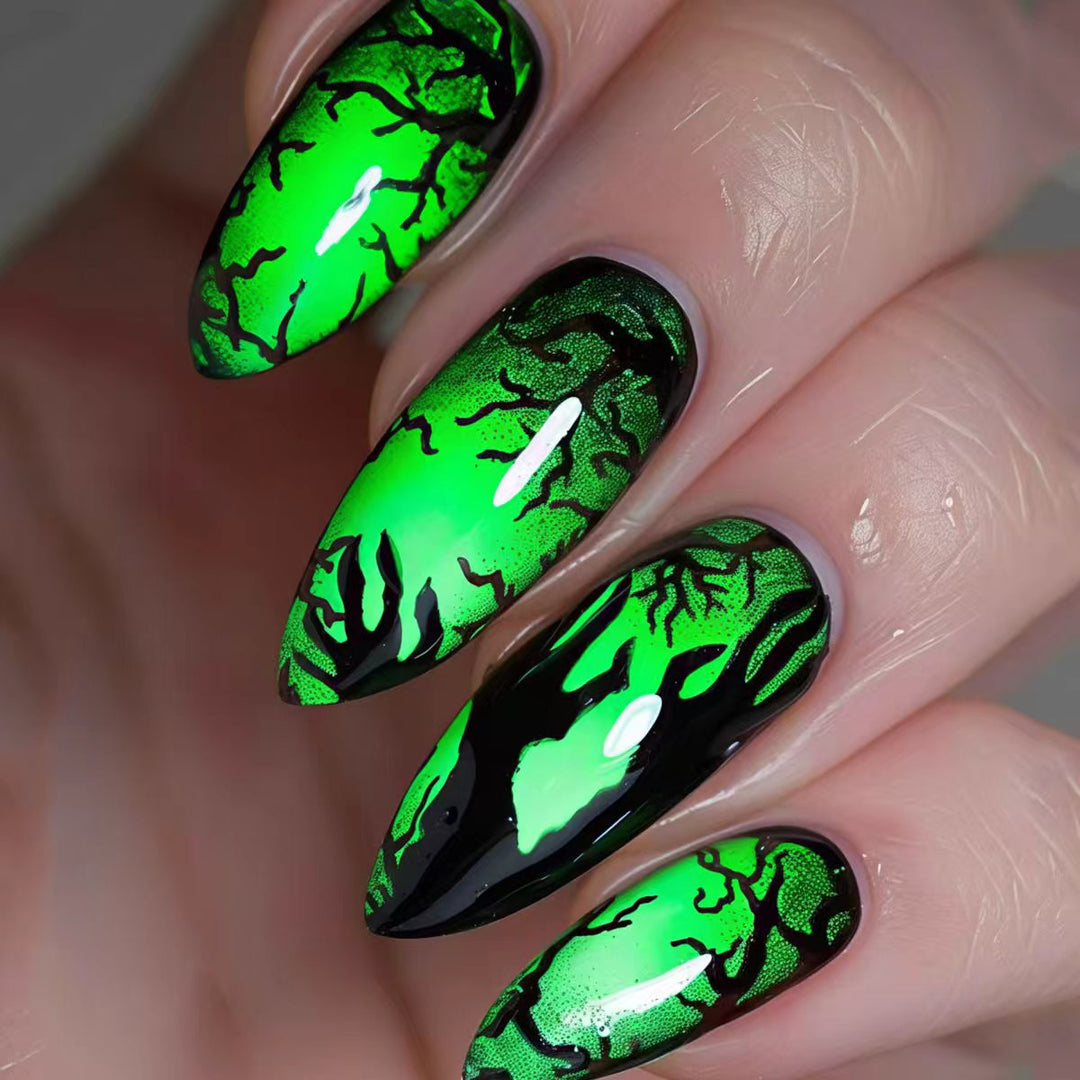 Creative nail art with spooky tree design Stornfield
