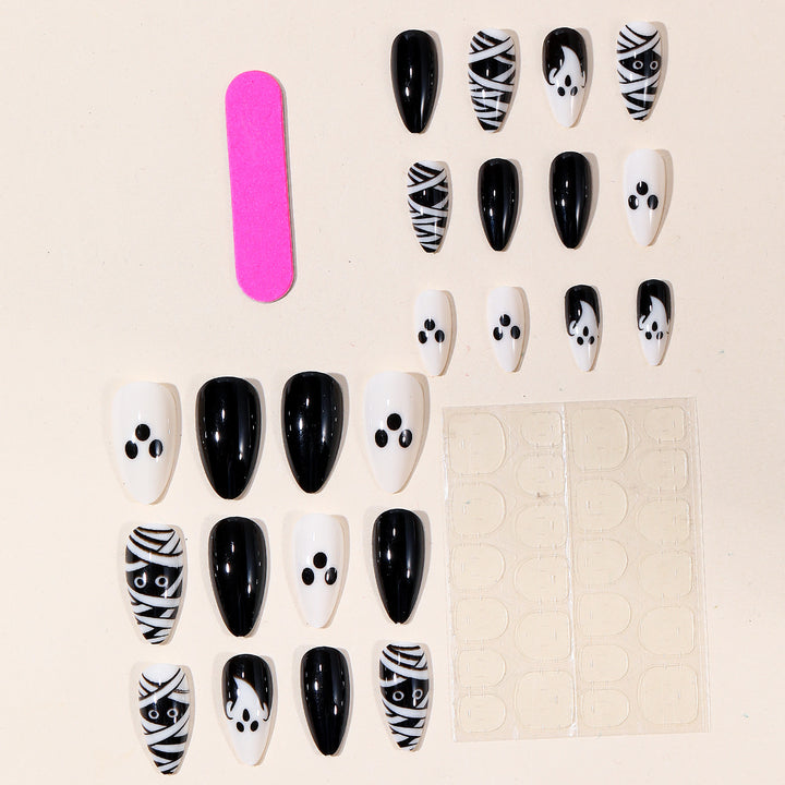Halloween-Themed Ghost and Mummy Nail Art Stornfield