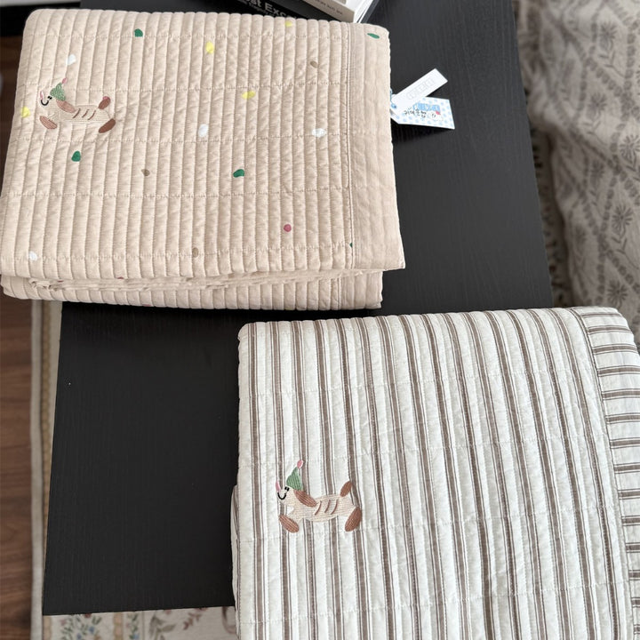 Quilted cotton bedspread with fine striped texture and cherry embroidery