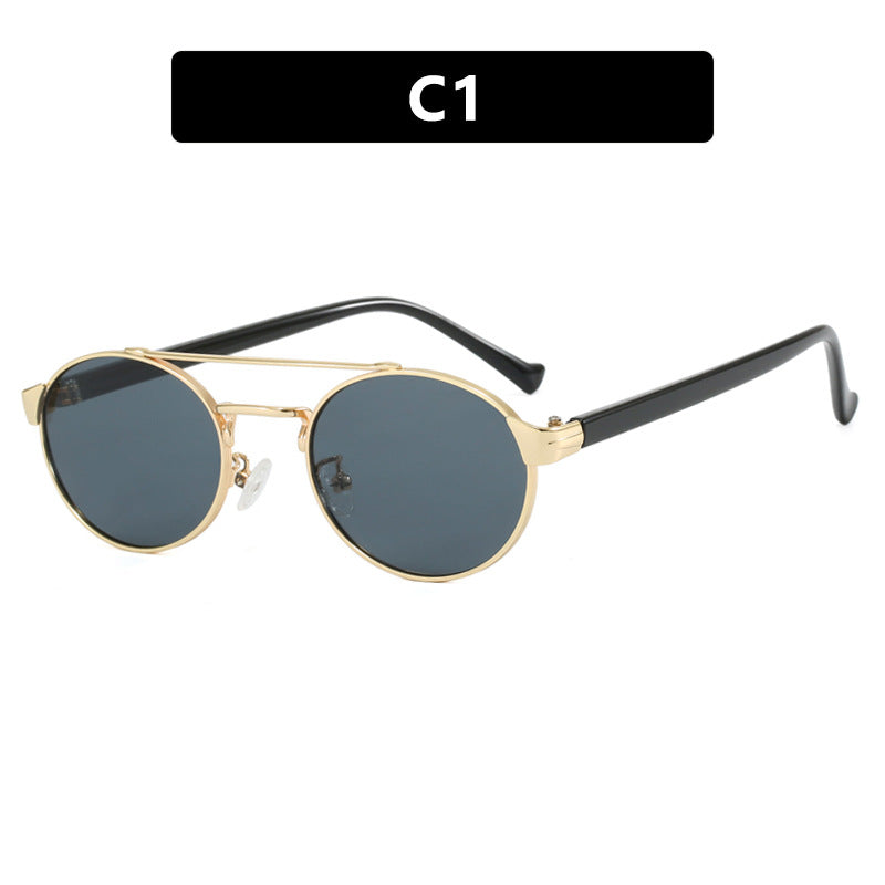 Ladies fashionable sunglasses in stylish round design with golden accents Stornfield