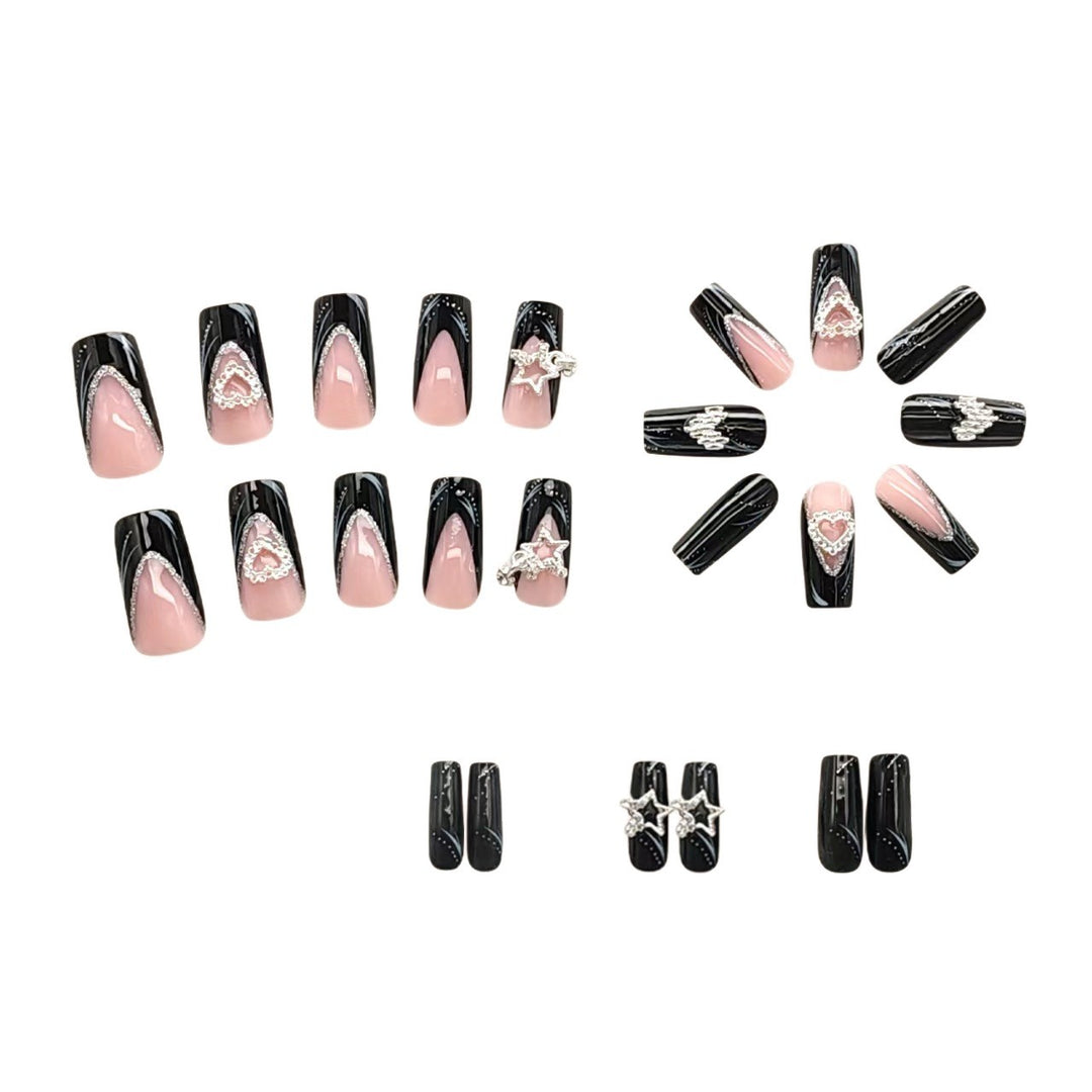 Artificial nails with elegant glitter accents and heart motifs Stornfield
