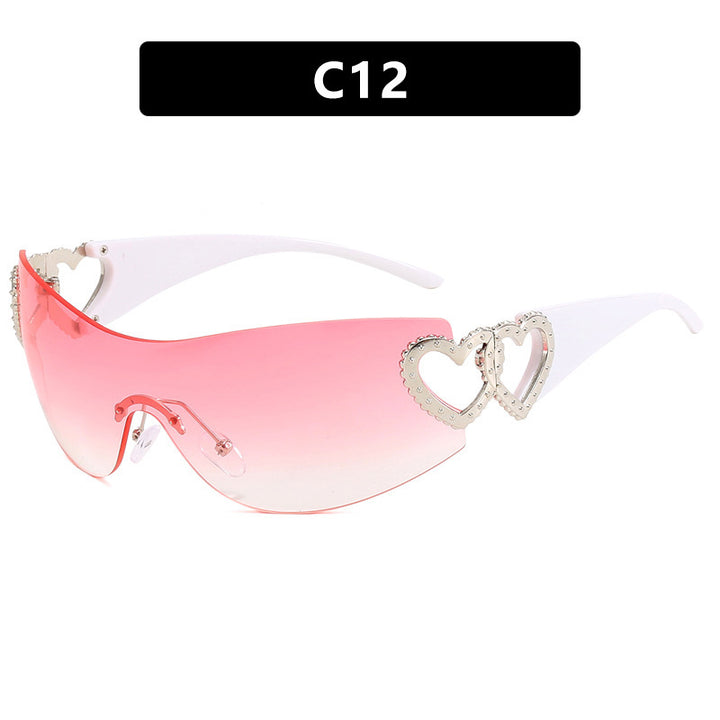 Ladies sporty sunglasses in trendy shield design with heart accents Stornfield