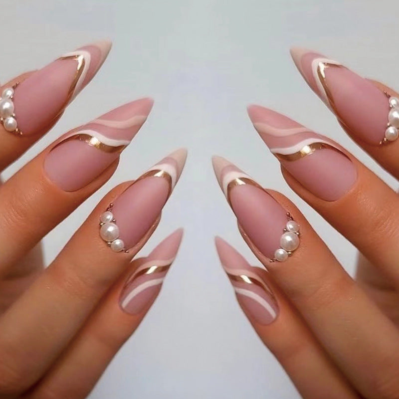 Artistic stiletto nails with elegant wave design Stornfield