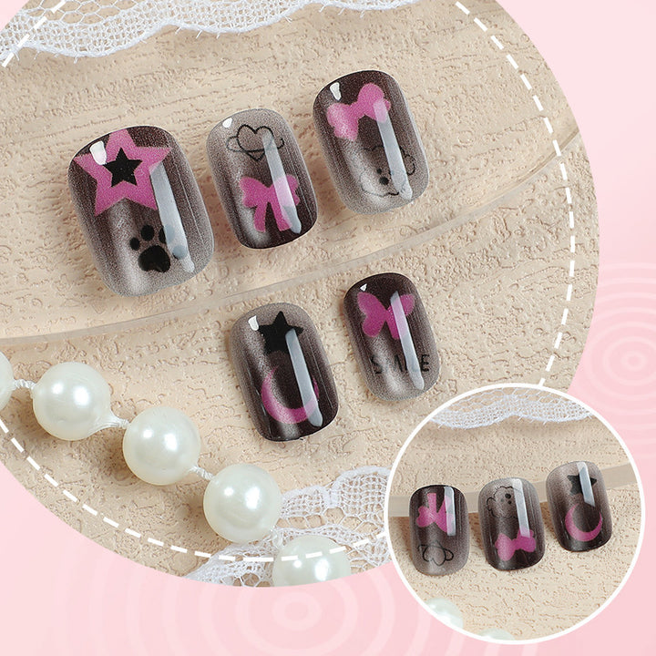 Artistic Press-On Nail Set with Star and Bow Designs