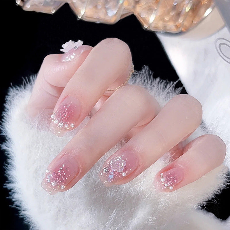 Artificial nail set with sparkling glitter and pearl decorations Stornfield