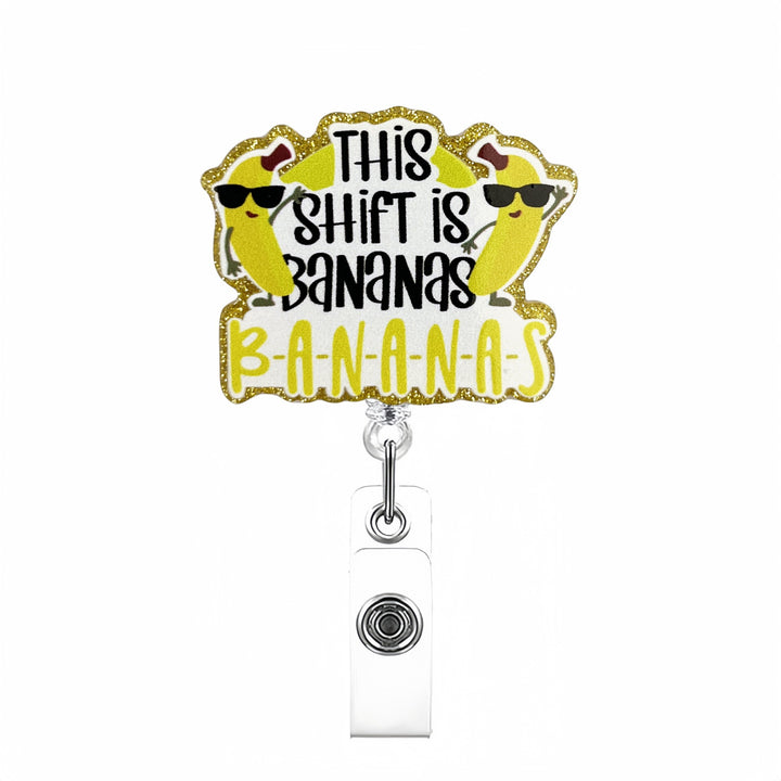 Expandable badge holder with anatomical heart pendant