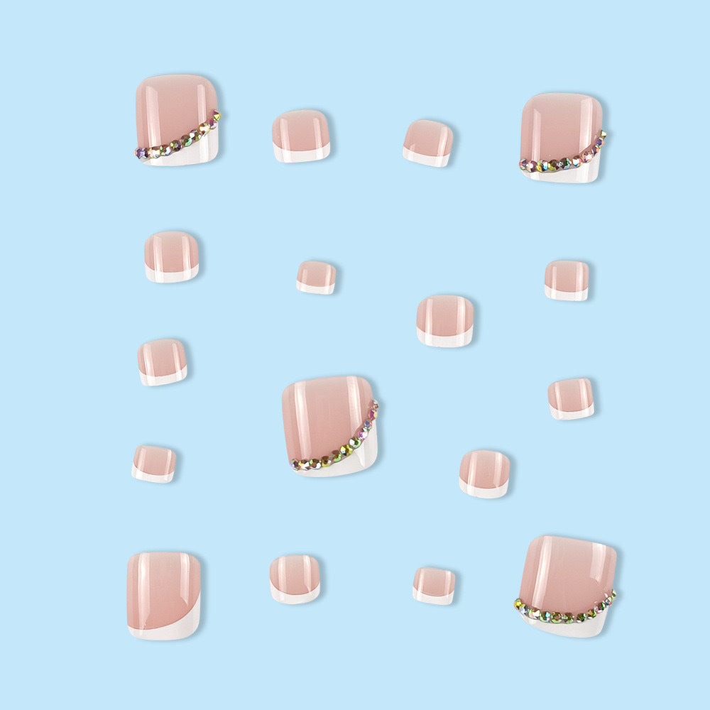 Nail art set with elegant French tips and glitter accents Stornfield
