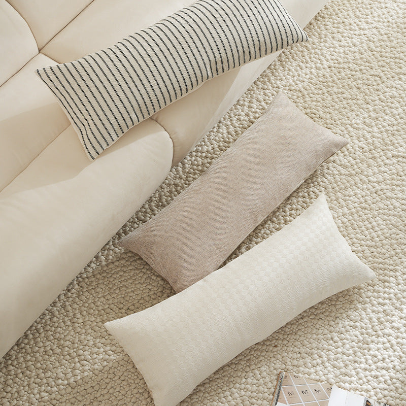 Long rectangular lumbar and neck pillow with textured woven look and concealed zipper Stornfield