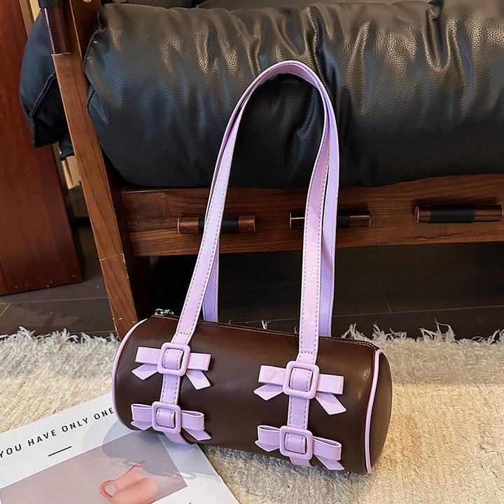 Bow-Accent Barrel Bag