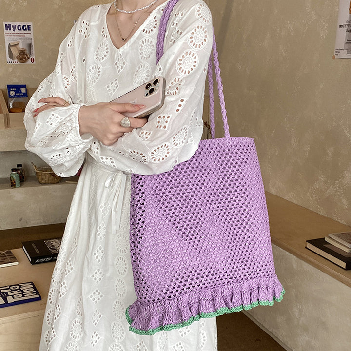 Handcrafted straw bag with fringed hem Stornfield