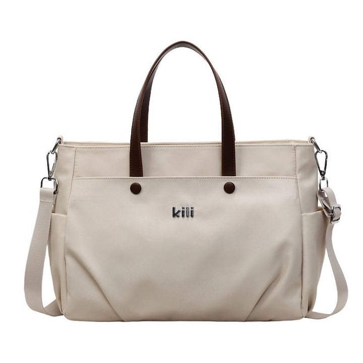 Shopping bag with comfortable carrying system and practical outer pockets Stornfield