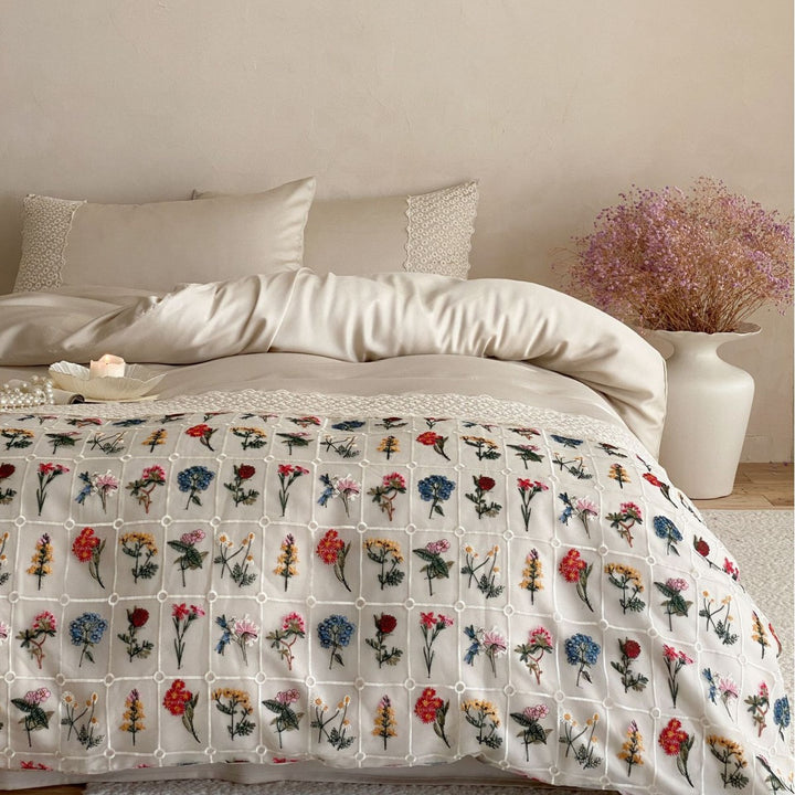 Embroidered duvet and bedspread with floral patchwork embroidery