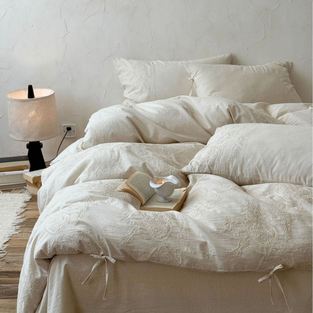 Luxurious cotton bedding set with embroidered paisley design and ties