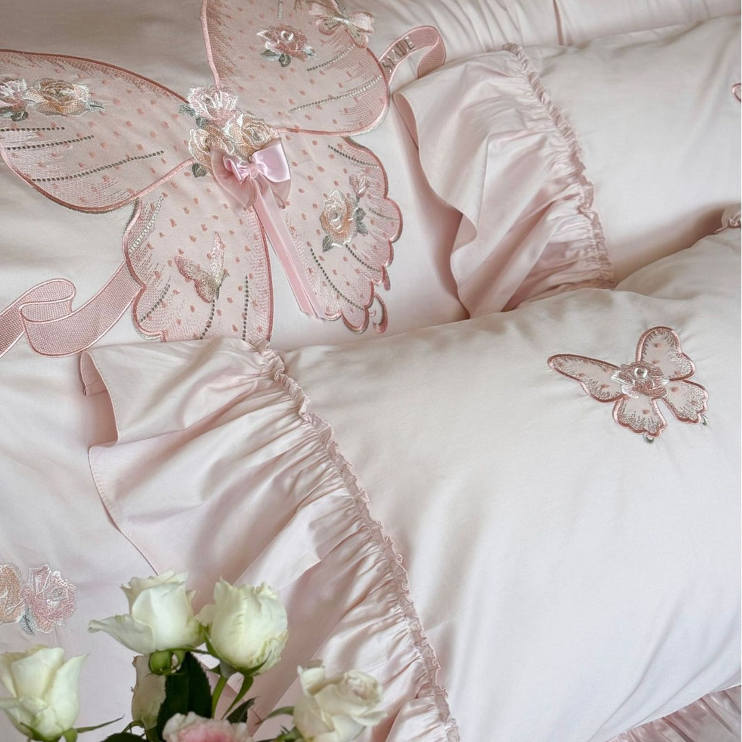 Romantic ruffled bedding set with butterfly embroidery and quilted comforter