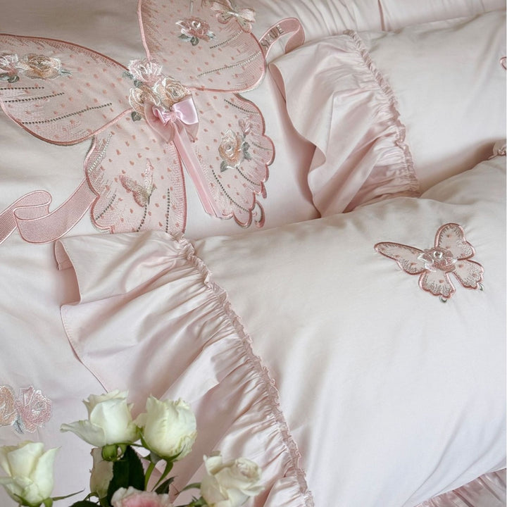 Romantic ruffled bedding set with butterfly embroidery and quilted comforter