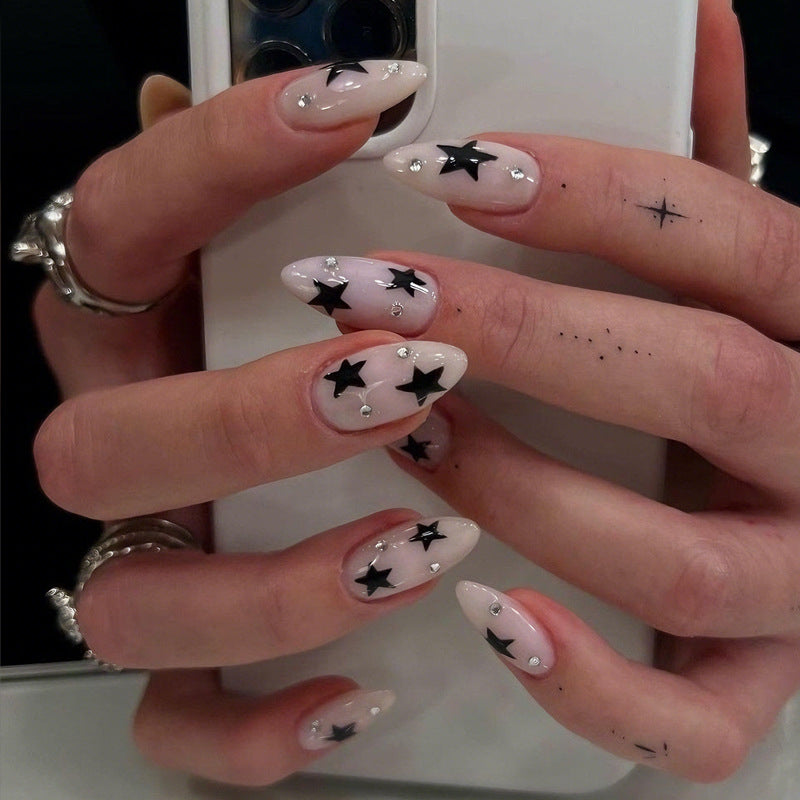 Nail art set with playful star designs Stornfield