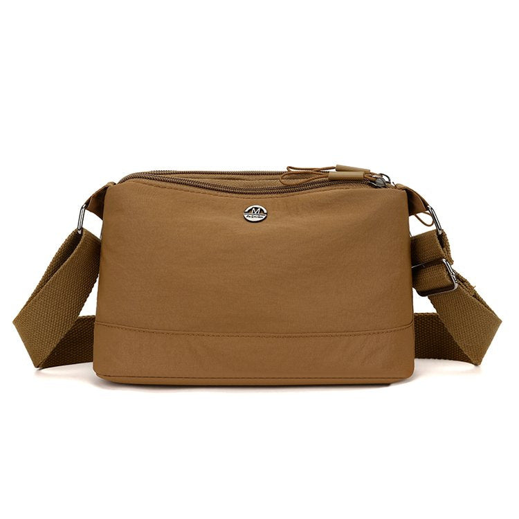 Shoulder bag with adjustable carrying strap and intelligent compartment system Stornfield