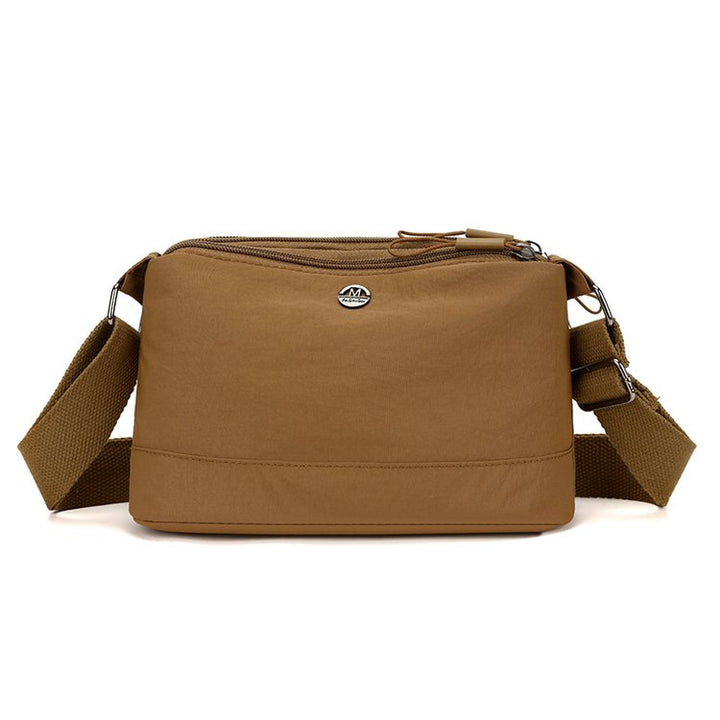Shoulder bag with adjustable carrying strap and intelligent compartment system Stornfield