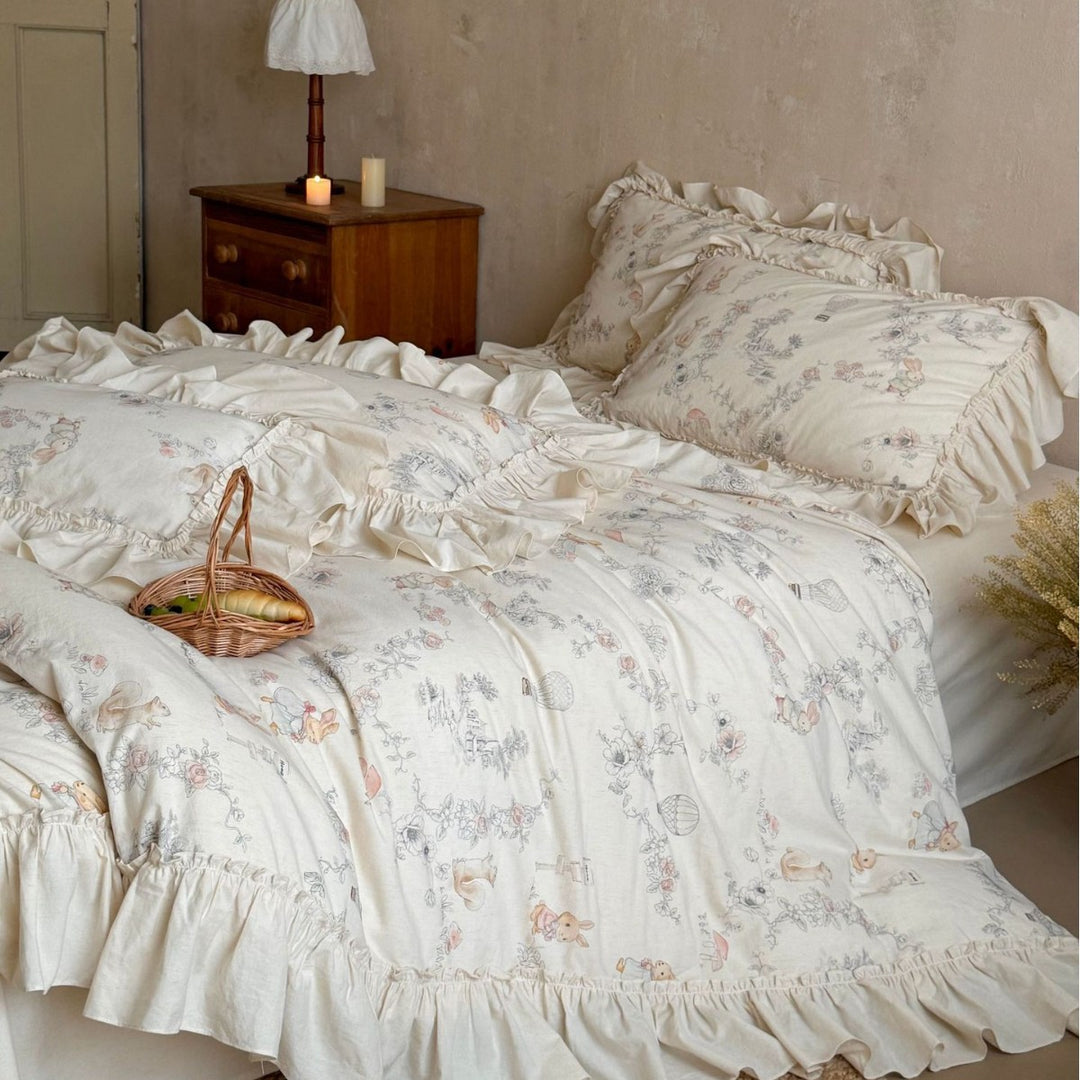 Romantic bedding set with ruffles, floral jacquard application and decorative cushions