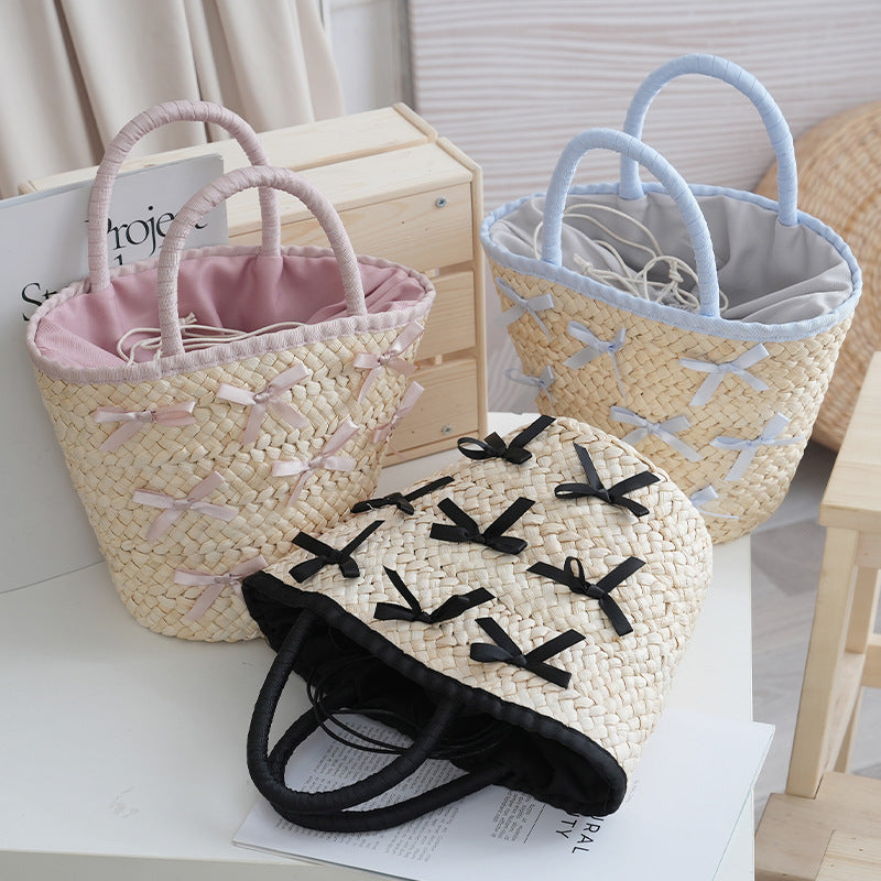 Basket bag with delicate bows and padded edge Stornfield
