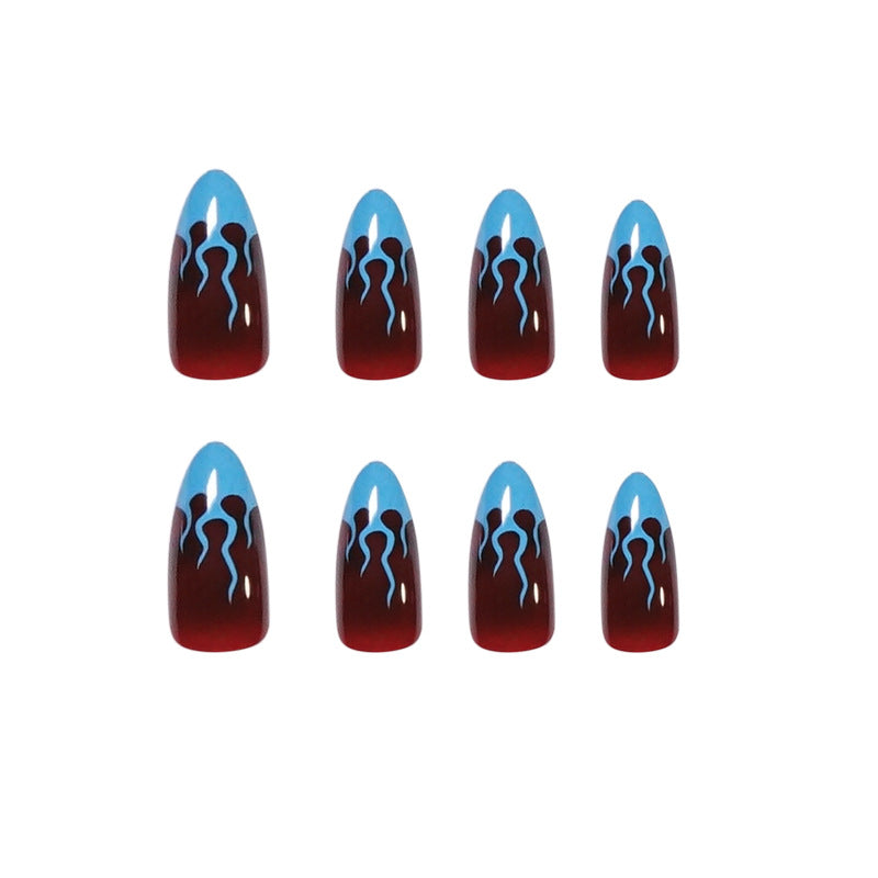 Artistic stiletto nails with extravagant flame pattern Stornfield