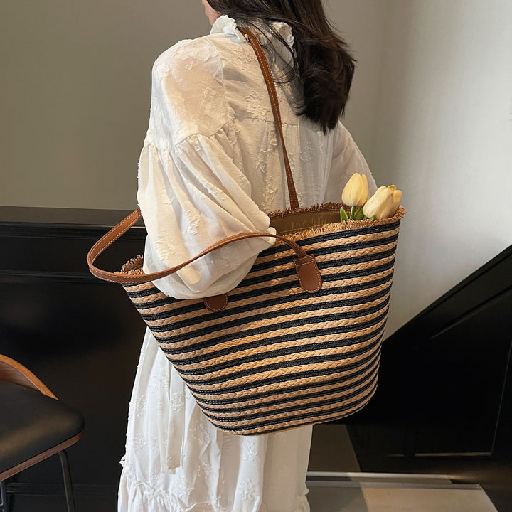 Generous beach bag with leather handles Stornfield