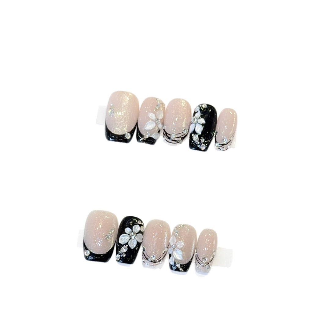 Exclusive artificial nails with floral accents and glitter coating Stornfield