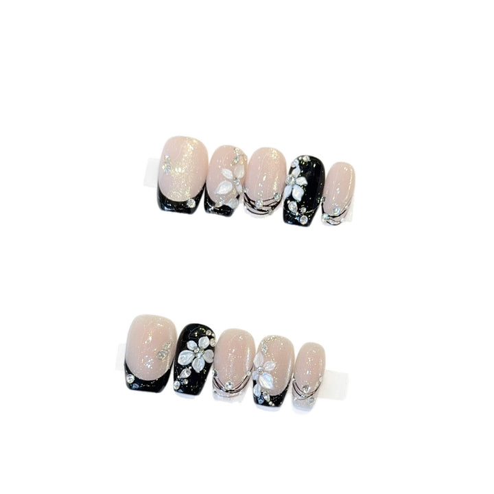 Exclusive artificial nails with floral accents and glitter coating Stornfield