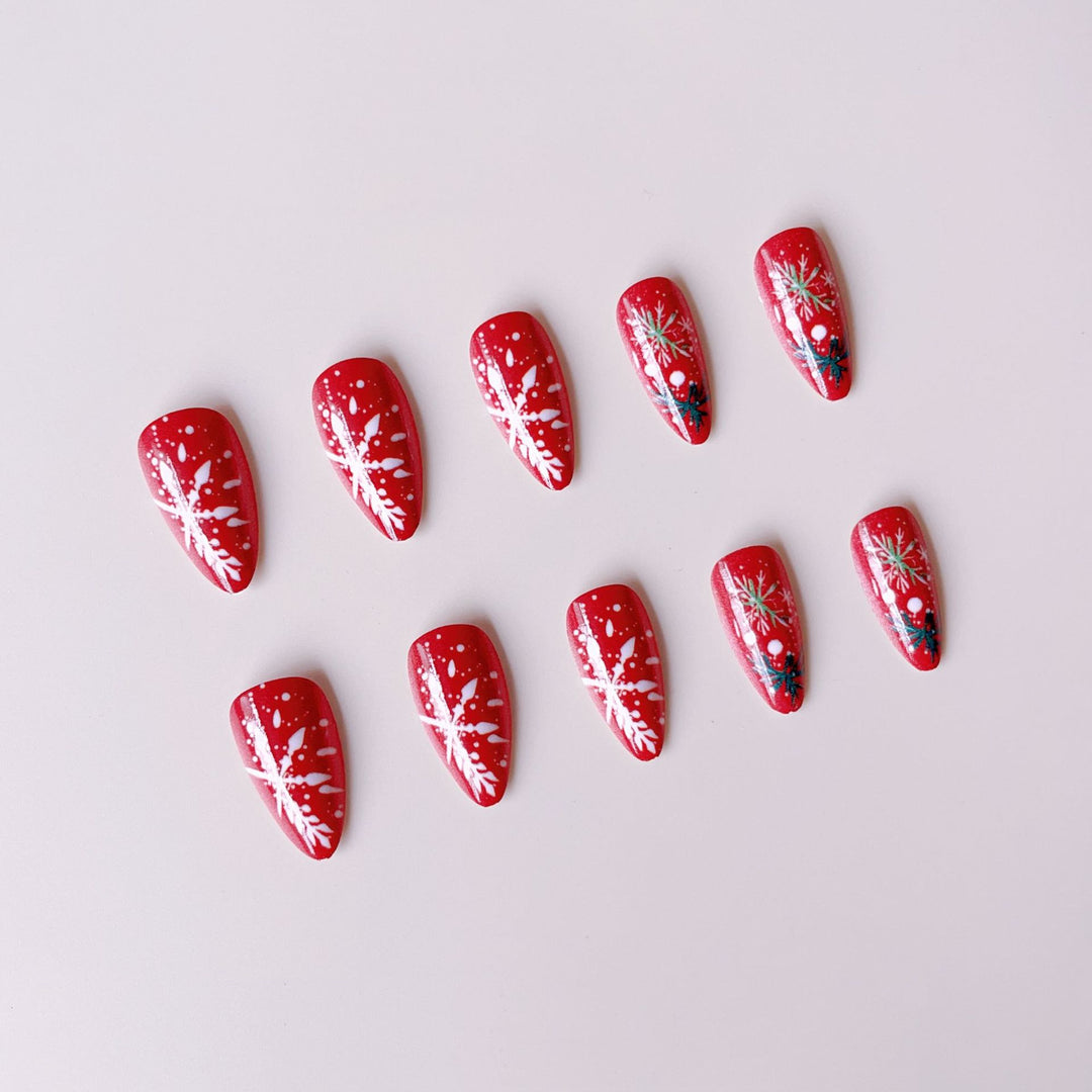 Acrylic nail set with festive motifs and handmade decorations Stornfield