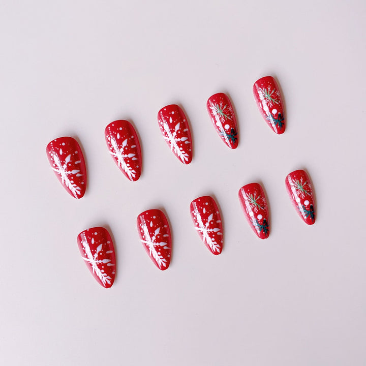 Acrylic nail set with festive motifs and handmade decorations Stornfield