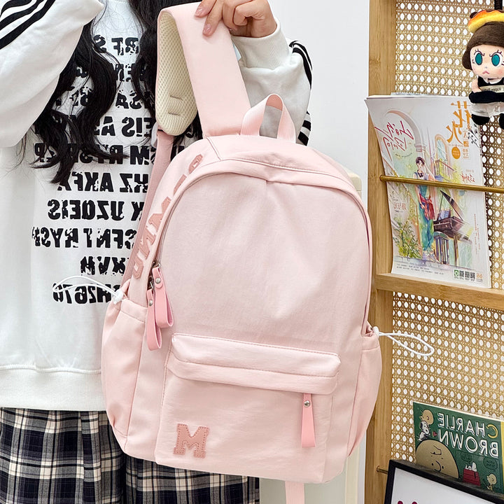 Stylish Canvas Backpack with Plush Keychain Stornfield