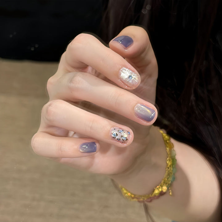 Glamorous artificial nails with elegant glitter elements Stornfield
