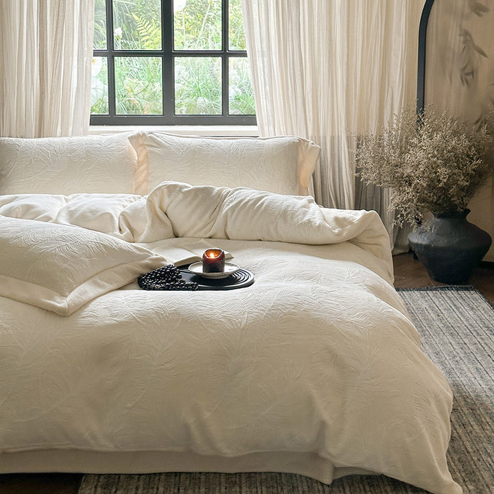 Quilted bed linen set made of fine cotton satin with embossed leaf quilting and hotel closure