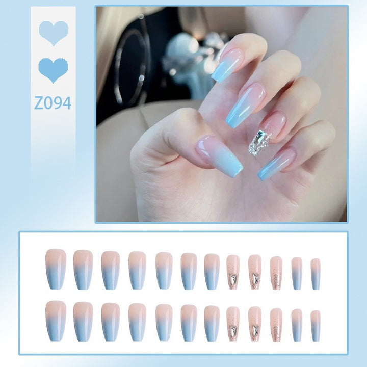 Nail set with elegant ombre and glitter accents Stornfield