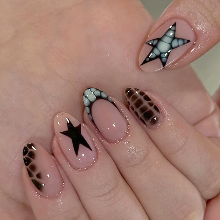 Artistic Press-On Nail Set with Star and Animal Print Accents Stornfield
