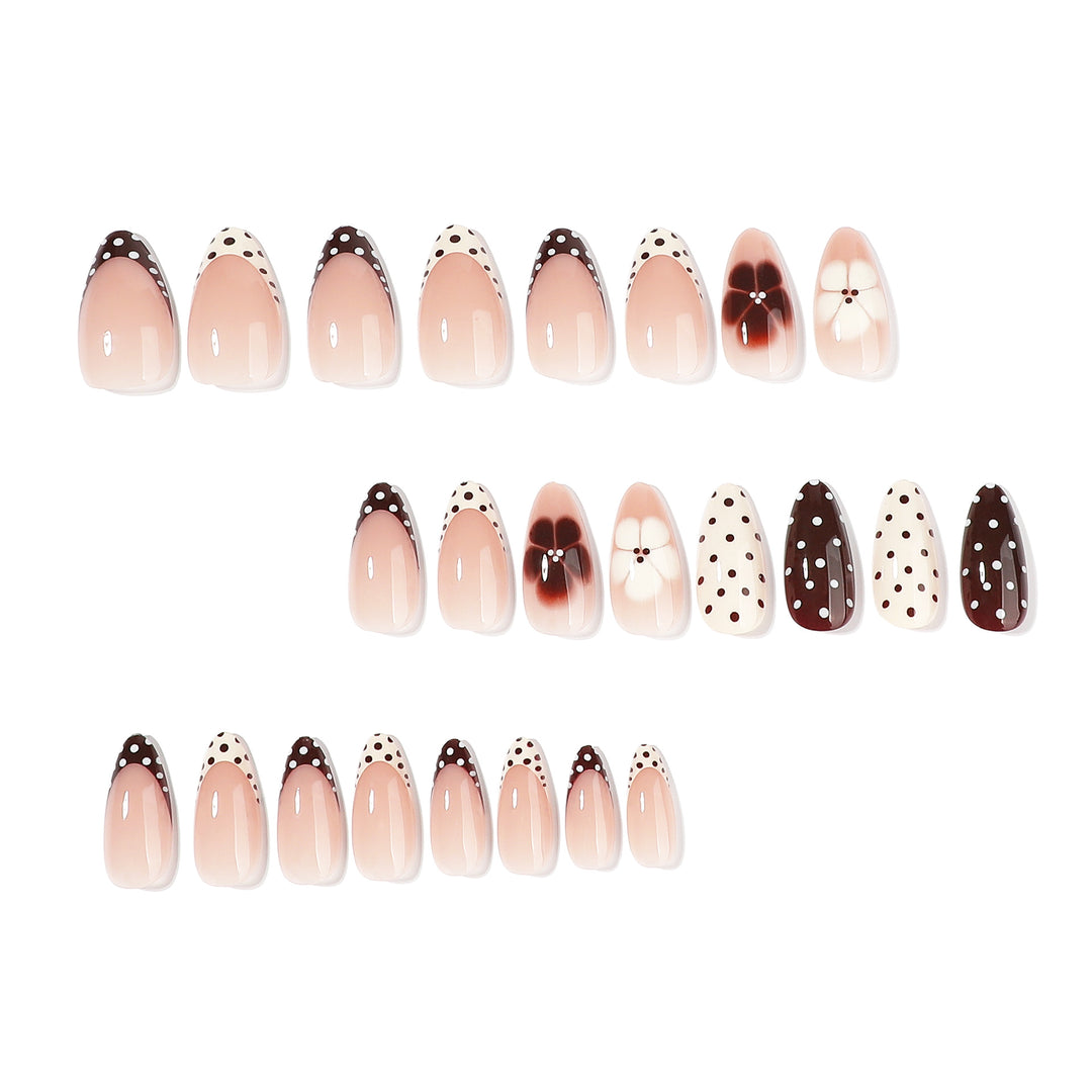Artful nail art with floral design and various patterns Stornfield