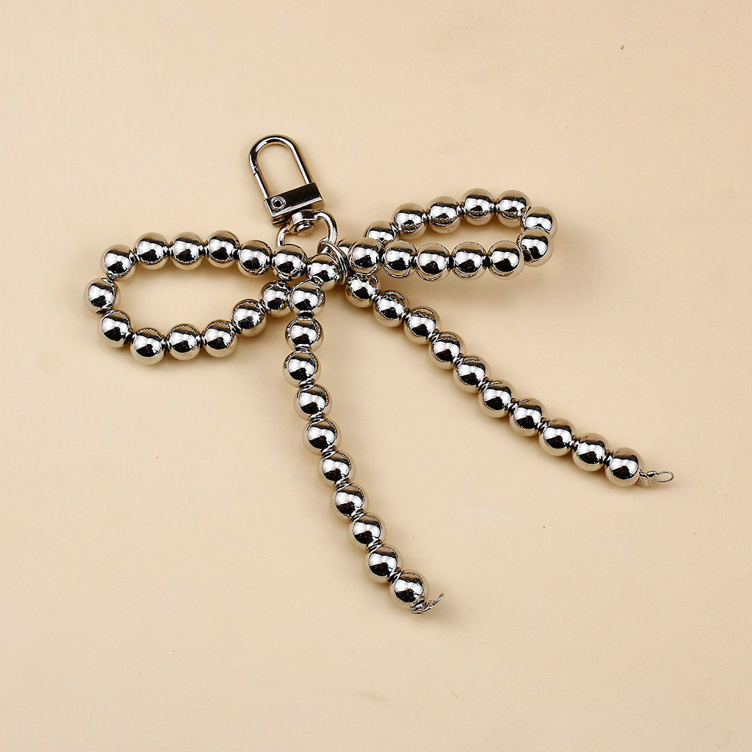 Elegant Pearl Bow Brooch Stornfield