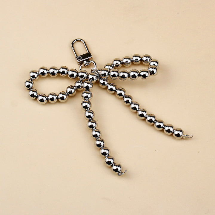 Elegant Pearl Bow Brooch Stornfield