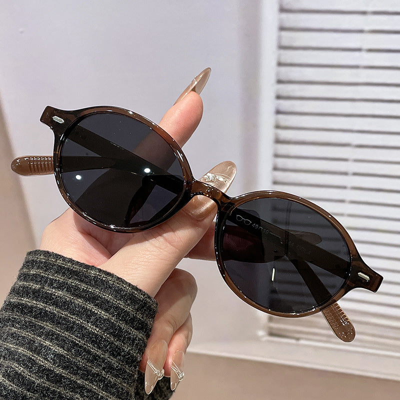 Ladies fashionable sunglasses in classic round design Stornfield