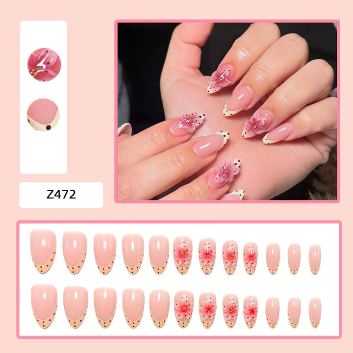 Artificial nails with floral design and elegant accents Stornfield