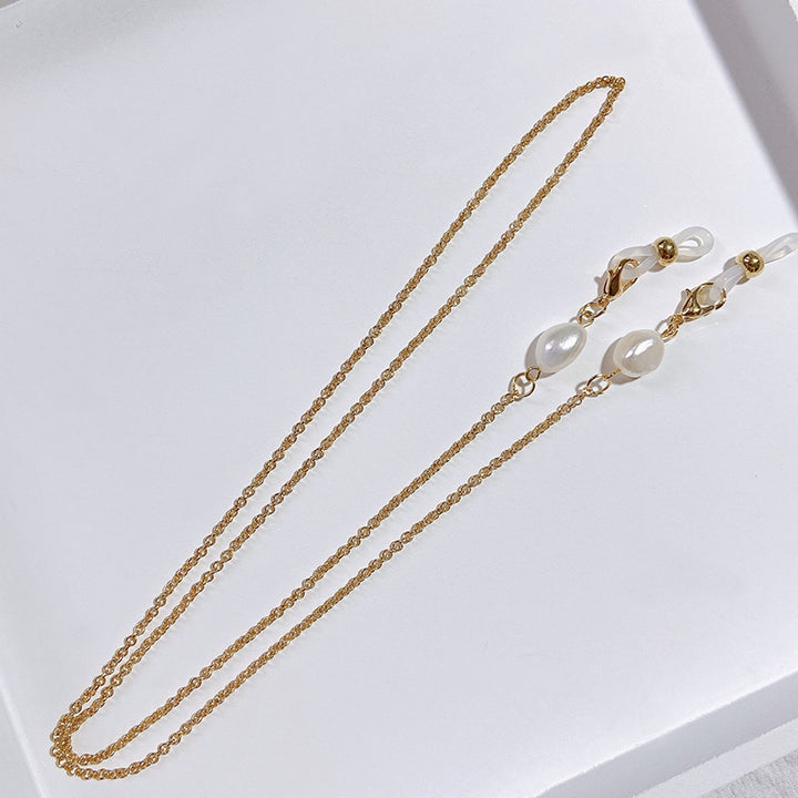 Elegant jewelry holder chain with pearl and gold accents Stornfield